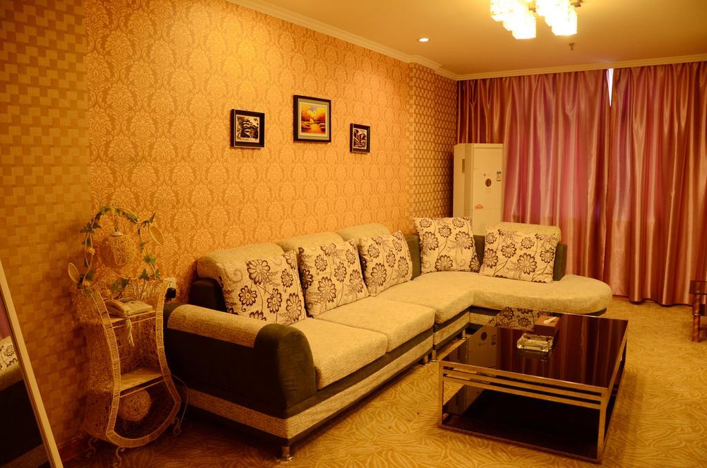 Omeiga Business Hotel Іу Номер фото