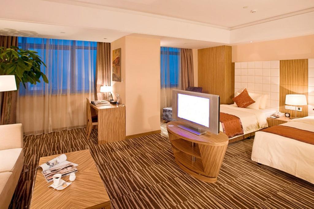Omeiga Business Hotel Іу Номер фото