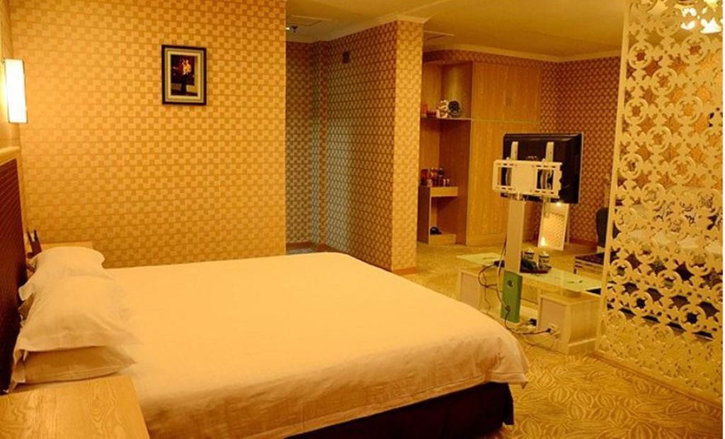 Omeiga Business Hotel Іу Номер фото