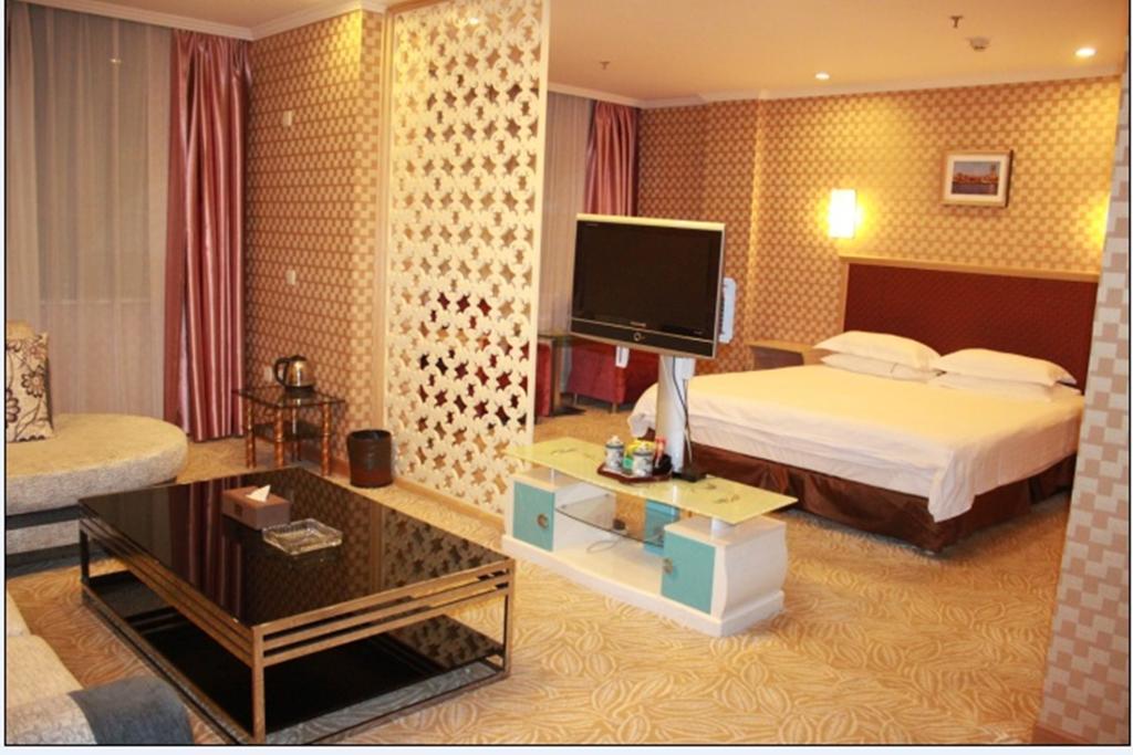 Omeiga Business Hotel Іу Номер фото