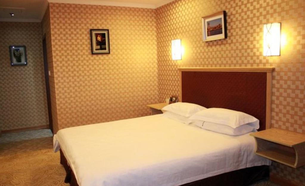 Omeiga Business Hotel Іу Номер фото